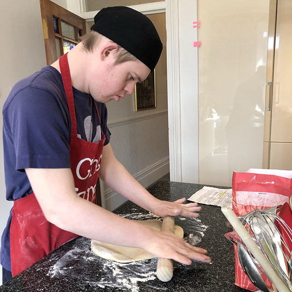 James rolling dough for marmite and cheese swirls